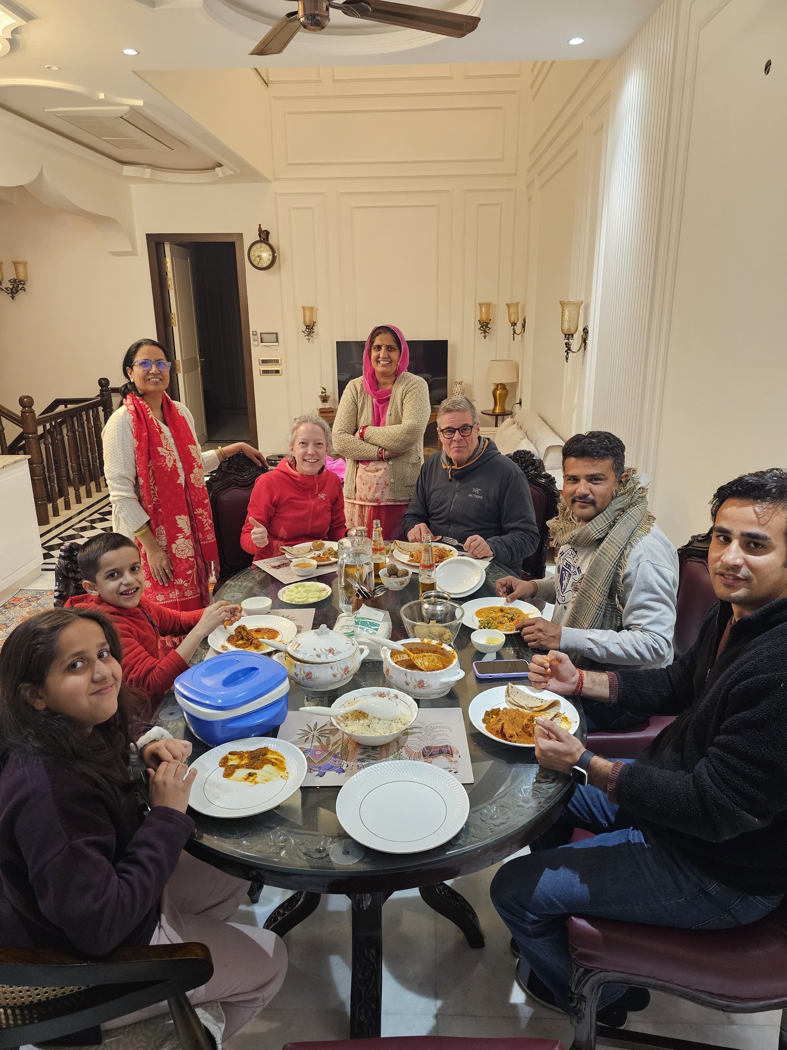 Guests gathered around the family dining table