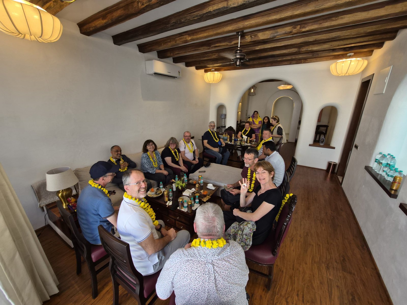Guests sharing a meal at the family table